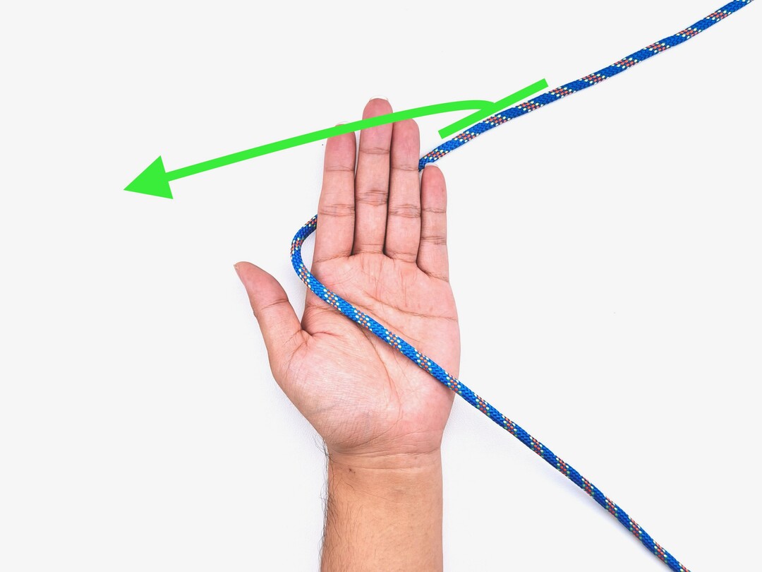 Step 1 of tying the Alpine Butterfly Loop knot - detailed visual instruction
