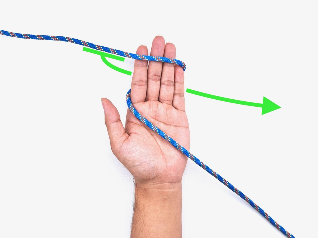 Step 2 of tying the Alpine Butterfly Loop knot - detailed visual instruction