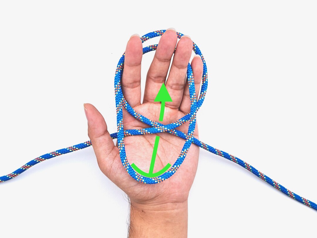 Step 5 of tying the Alpine Butterfly Loop knot - detailed visual instruction