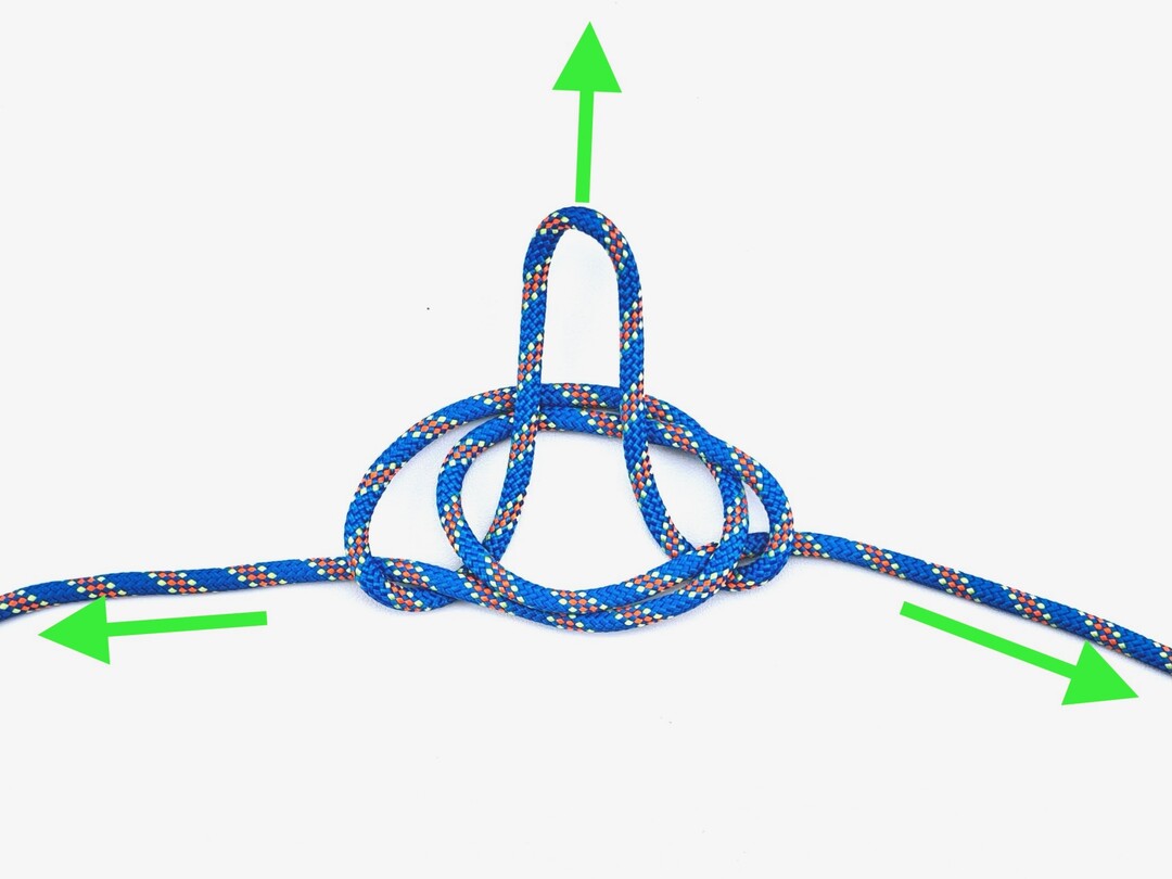 Step 7 of tying the Alpine Butterfly Loop knot - detailed visual instruction