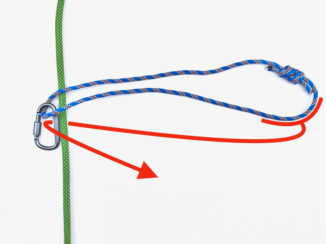 Step 2 of tying the Bachmann Knot knot - detailed visual instruction