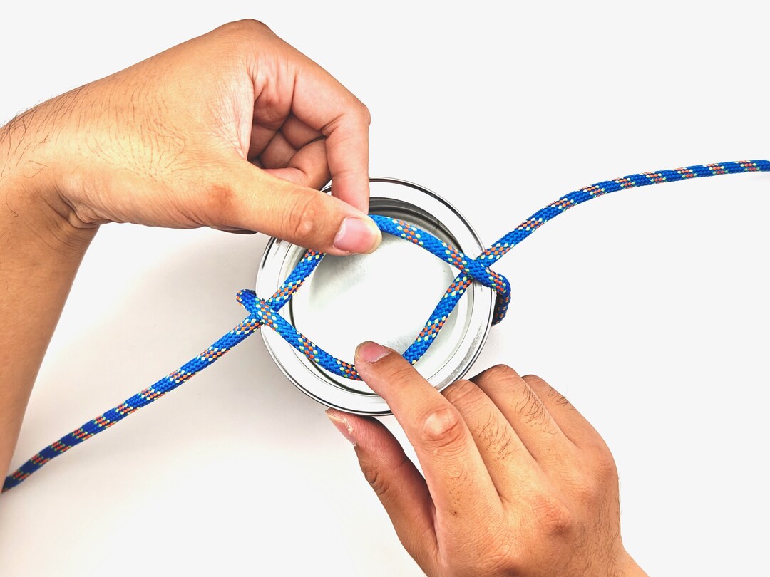 Step 4 of tying the Barrel Hitch knot - detailed visual instruction
