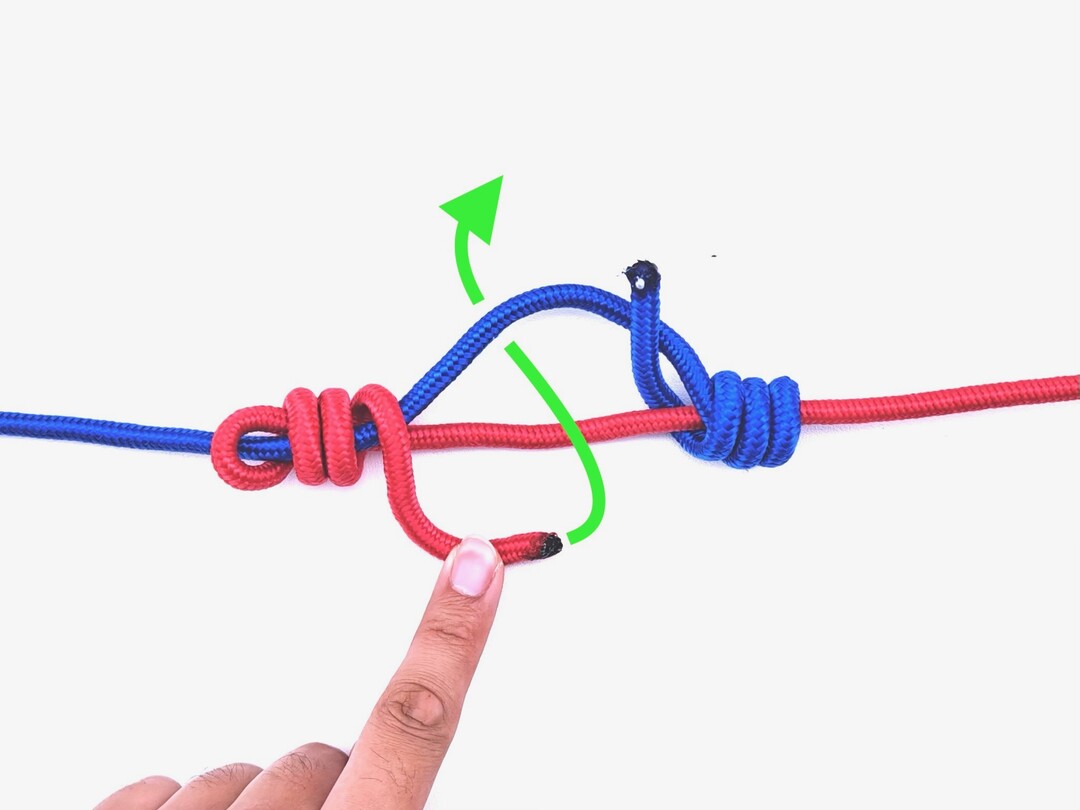 Step 7 of tying the Blood Knot knot - detailed visual instruction