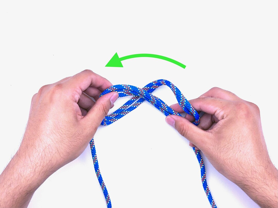 Step 5 of tying the Boa Knot knot - detailed visual instruction