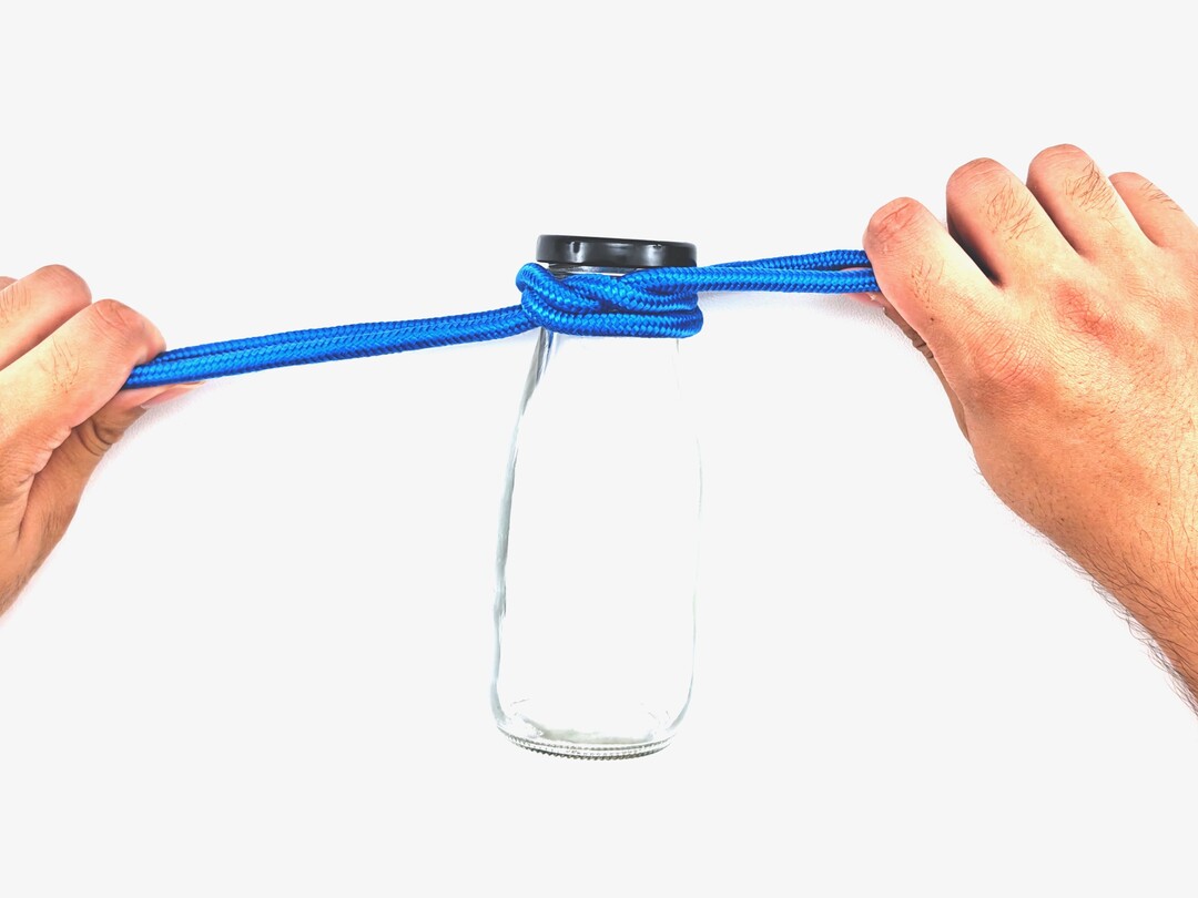 Step 7 of tying the Bottle Sling (Bight) knot - detailed visual instruction