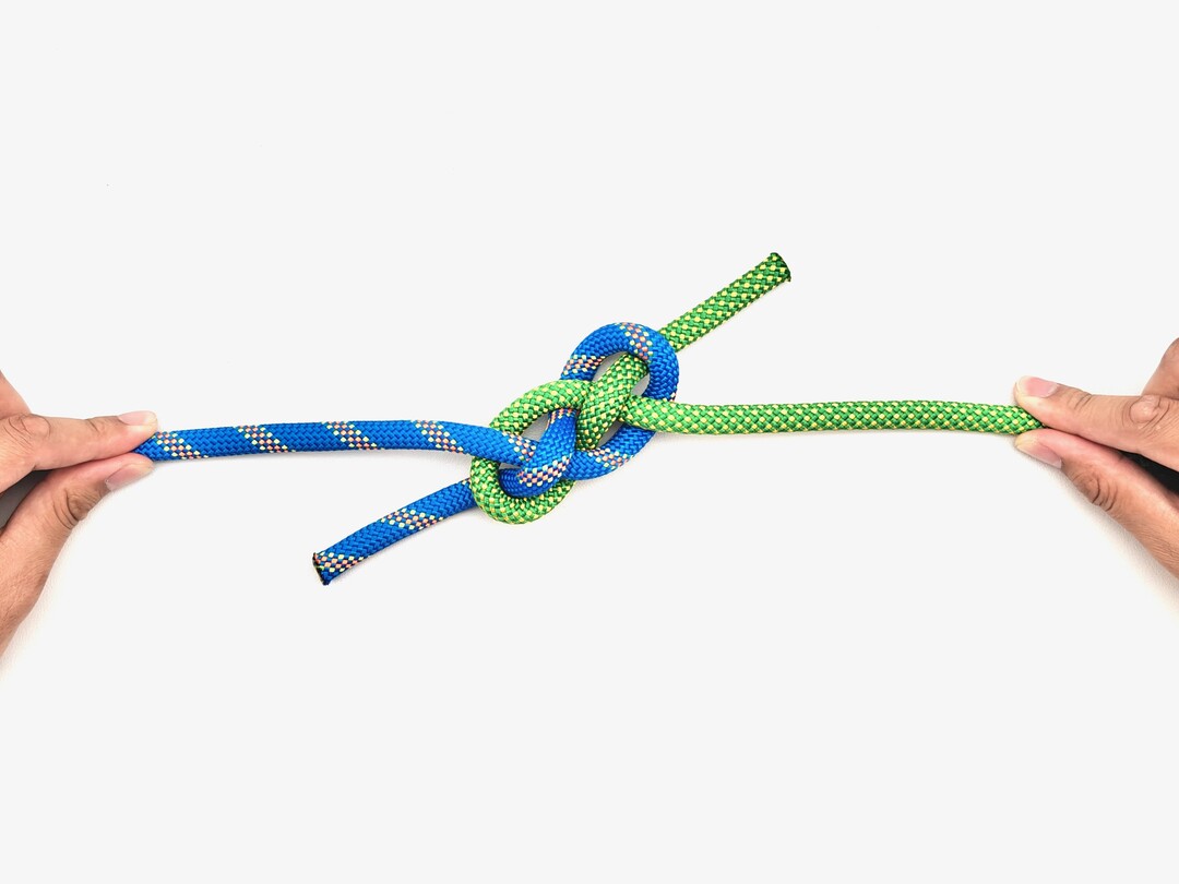 Step 5 of tying the Carrick Bend knot - detailed visual instruction