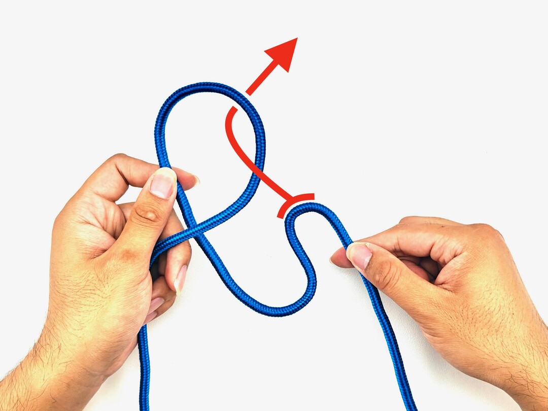 Step 2 of tying the Chain Sinnet knot - detailed visual instruction