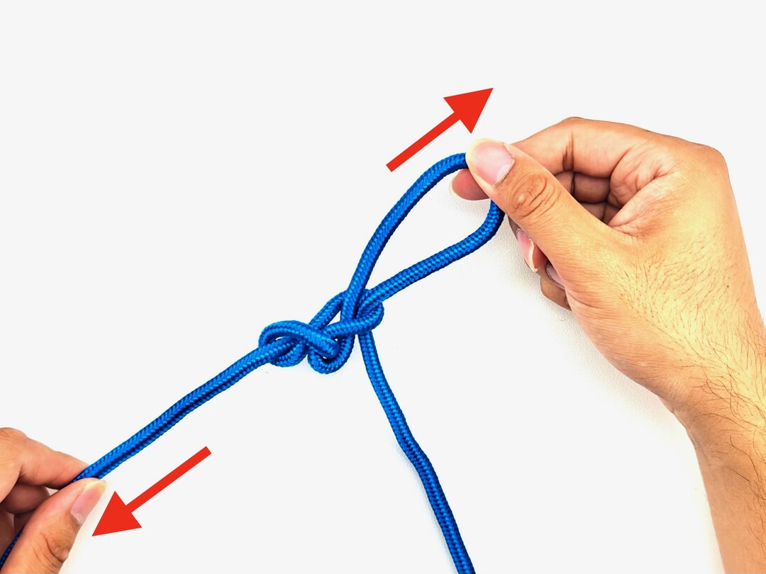 Step 5 of tying the Chain Sinnet knot - detailed visual instruction