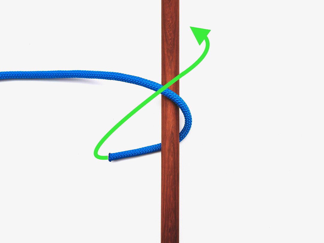 Step 1 of tying the Clove Hitch (Rope End) knot - detailed visual instruction