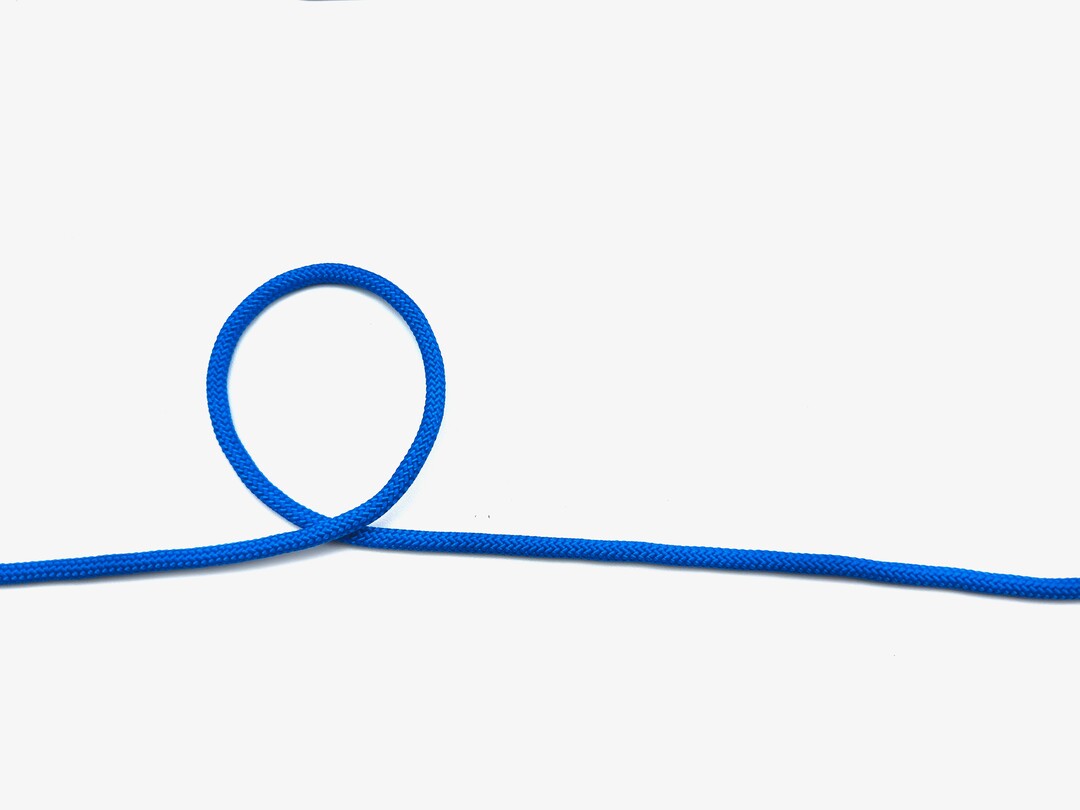 Step 1 of tying the Clove Hitch (Middle of Rope) knot - detailed visual instruction