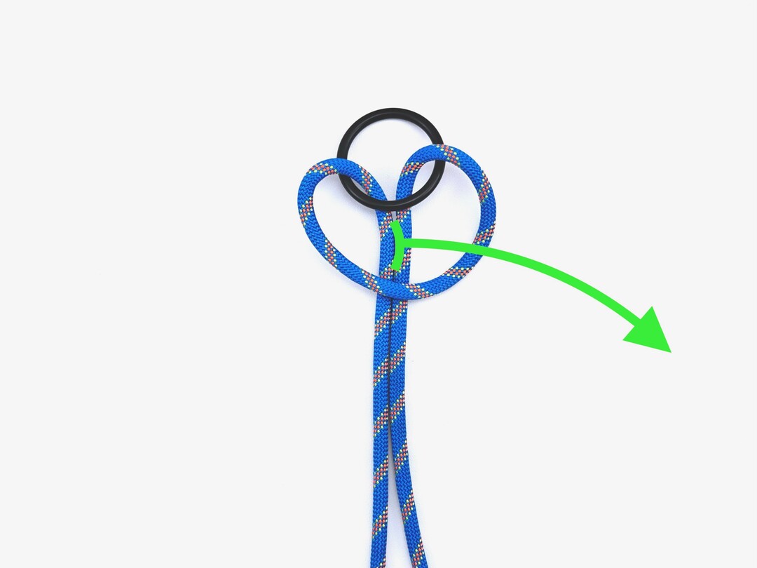 Step 2 of tying the Cow Hitch knot - detailed visual instruction