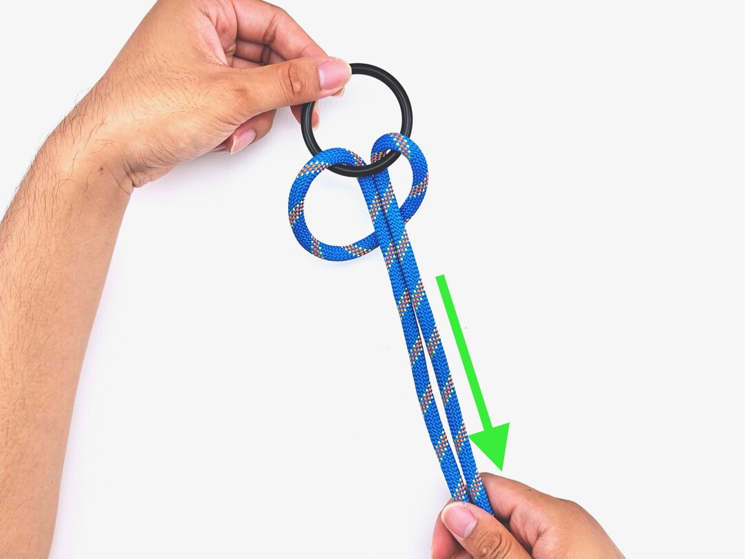 Step 4 of tying the Cow Hitch knot - detailed visual instruction