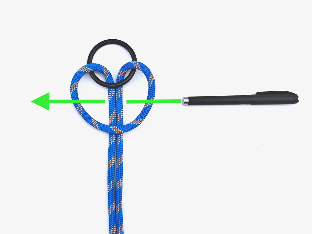 Step 2 of tying the Cow Hitch with Toggle knot - detailed visual instruction