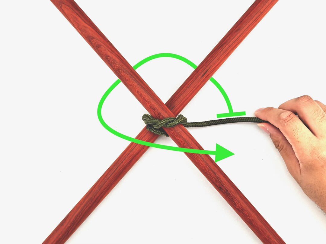 Step 2 of tying the Diagonal Lashing knot - detailed visual instruction
