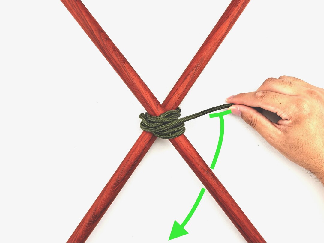Step 4 of tying the Diagonal Lashing knot - detailed visual instruction
