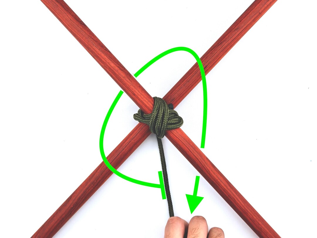 Step 6 of tying the Diagonal Lashing knot - detailed visual instruction