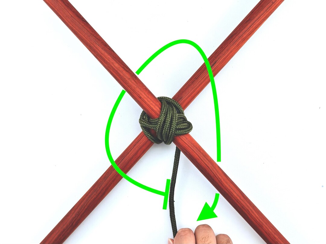 Step 7 of tying the Diagonal Lashing knot - detailed visual instruction