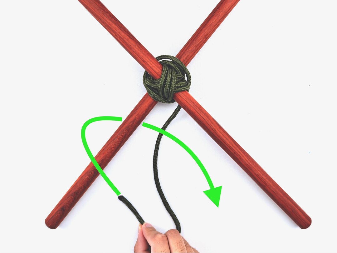 Step 8 of tying the Diagonal Lashing knot - detailed visual instruction