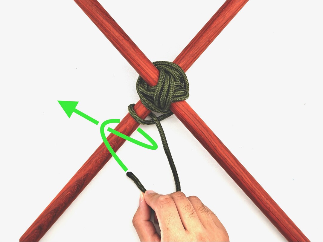 Step 9 of tying the Diagonal Lashing knot - detailed visual instruction