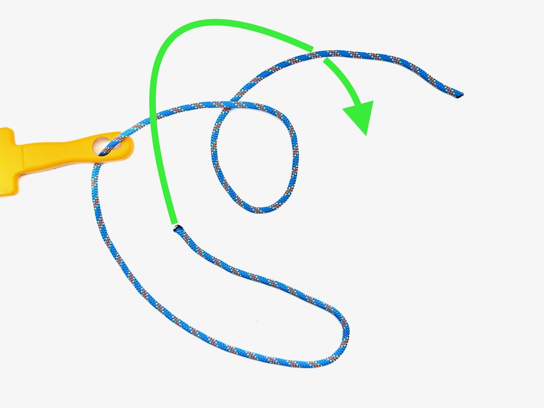 Step 3 of tying the Diamond Knot knot - detailed visual instruction