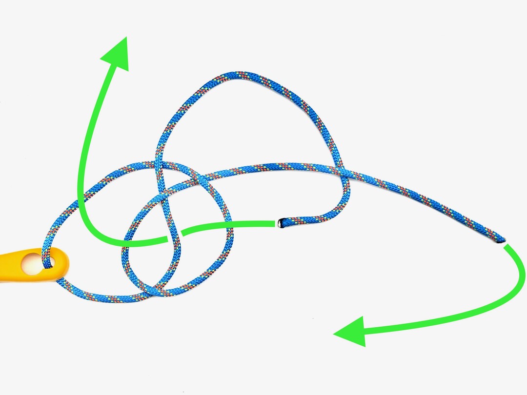 Step 5 of tying the Diamond Knot knot - detailed visual instruction