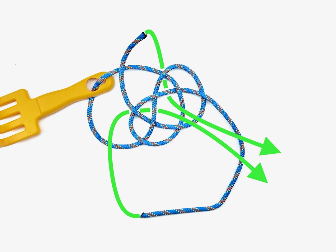 Step 6 of tying the Diamond Knot knot - detailed visual instruction