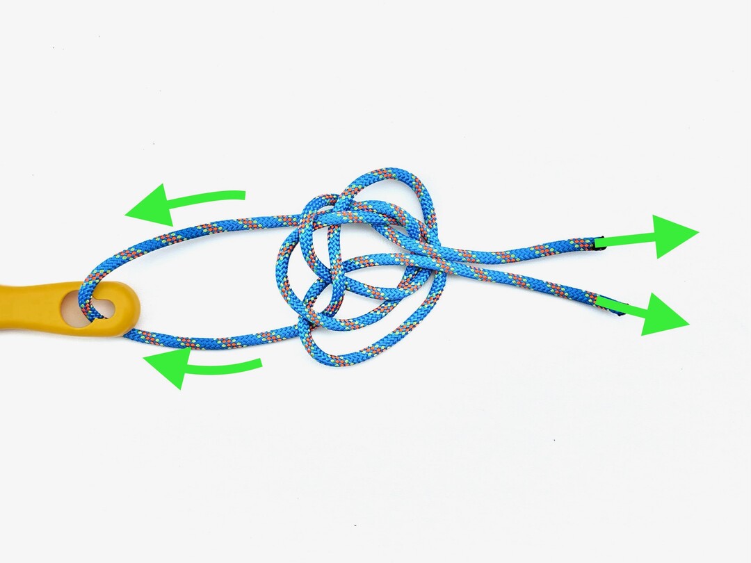 Step 7 of tying the Diamond Knot knot - detailed visual instruction