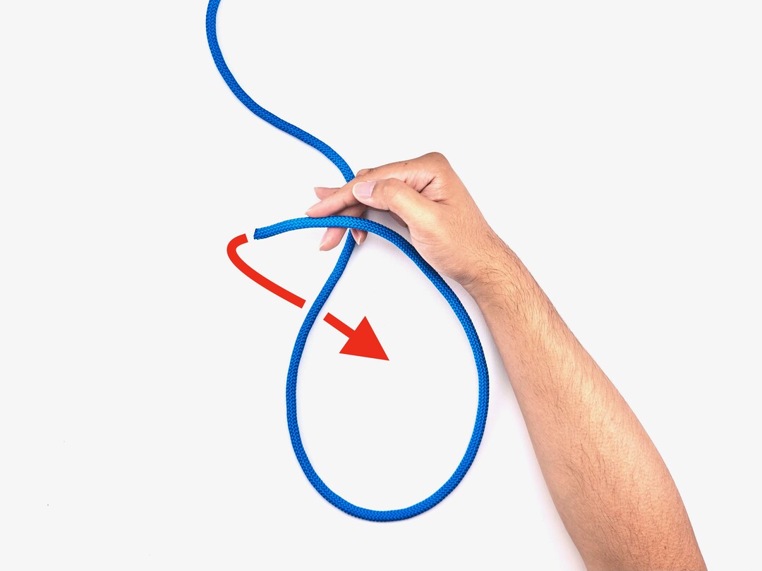 Step 2 of tying the Double Bowline knot - detailed visual instruction