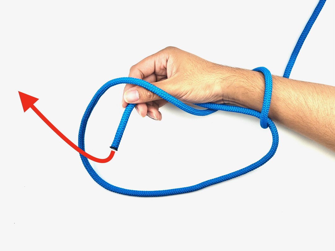 Step 5 of tying the Double Bowline knot - detailed visual instruction