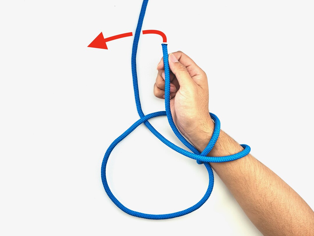 Step 7 of tying the Double Bowline knot - detailed visual instruction