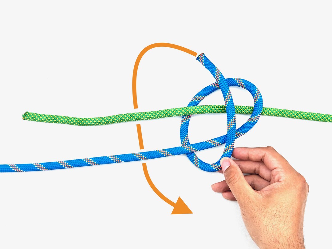 Step 3 of tying the Double Fisherman's Knot knot - detailed visual instruction