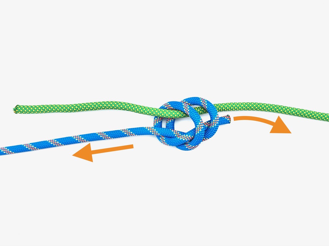 Step 5 of tying the Double Fisherman's Knot knot - detailed visual instruction