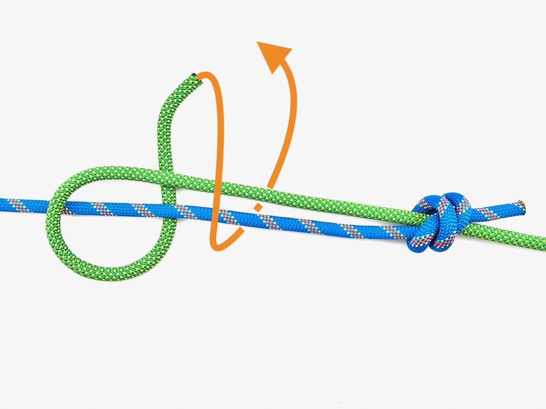 Step 7 of tying the Double Fisherman's Knot knot - detailed visual instruction