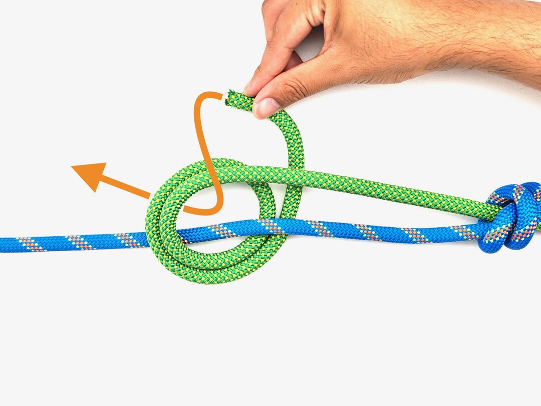 Step 8 of tying the Double Fisherman's Knot knot - detailed visual instruction