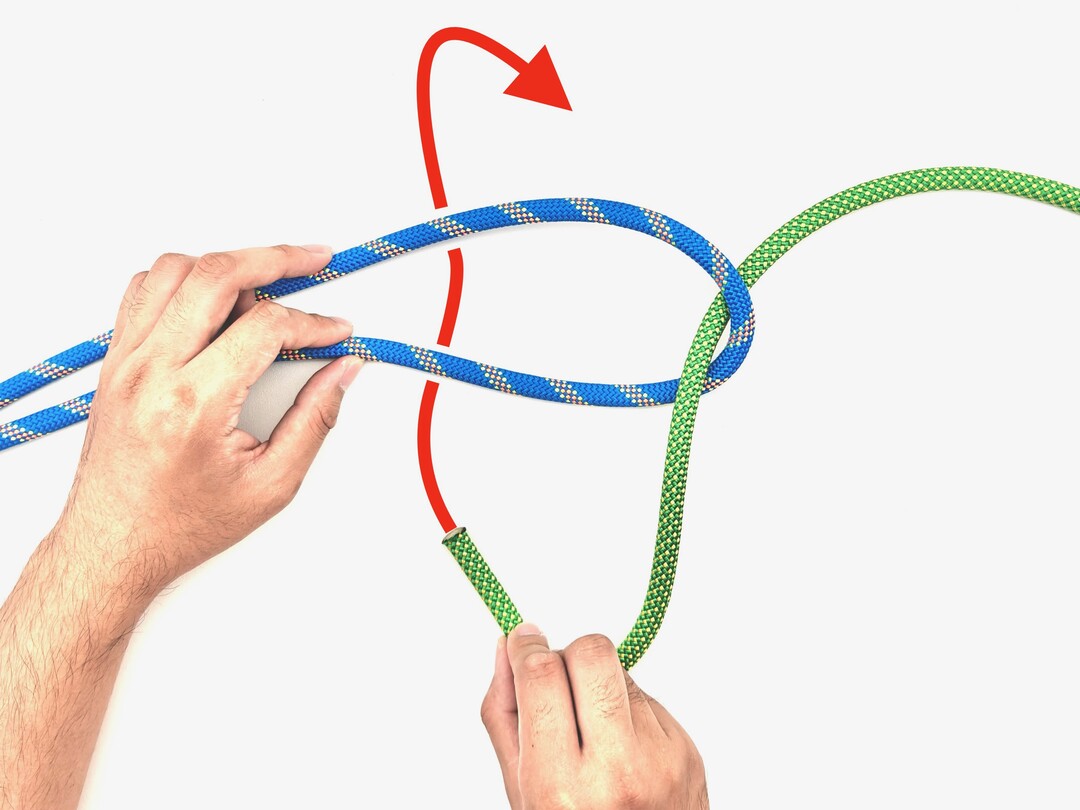 Step 3 of tying the Double Sheet Bend knot - detailed visual instruction