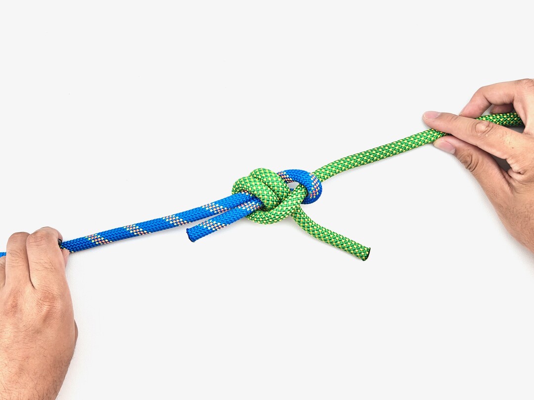 Step 7 of tying the Double Sheet Bend knot - detailed visual instruction