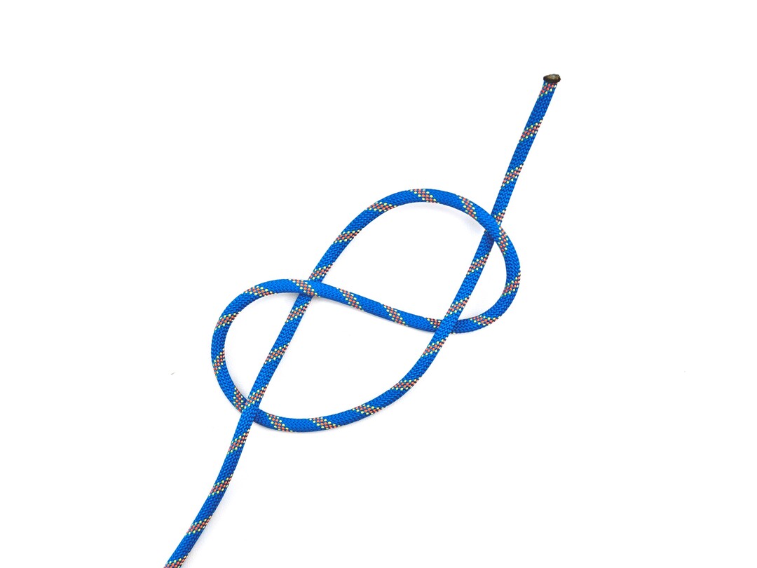 Step 2 of tying the Figure Eight Follow Through knot - detailed visual instruction