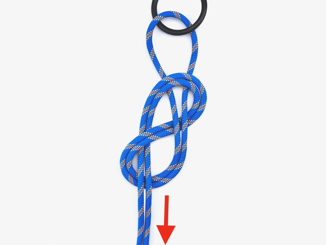 Step 7 of tying the Figure Eight Follow Through knot - detailed visual instruction
