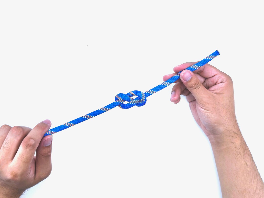 Step 6 of tying the Figure Eight knot - detailed visual instruction