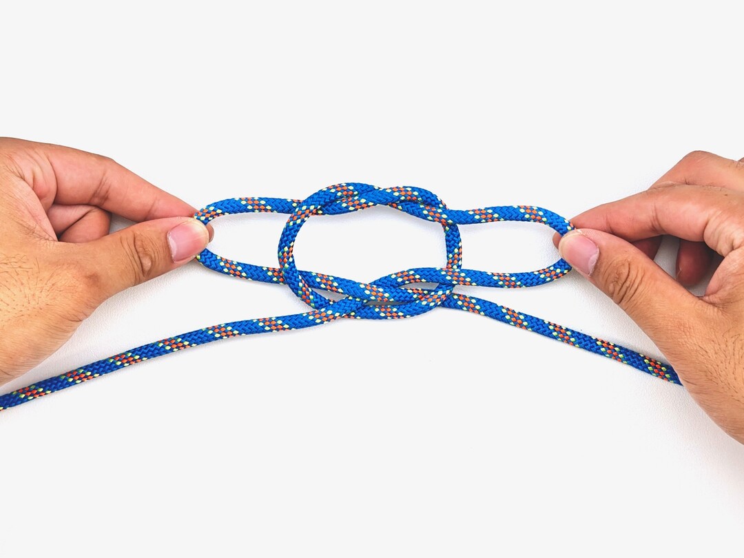 Step 4 of tying the Fireman's Chair knot - detailed visual instruction