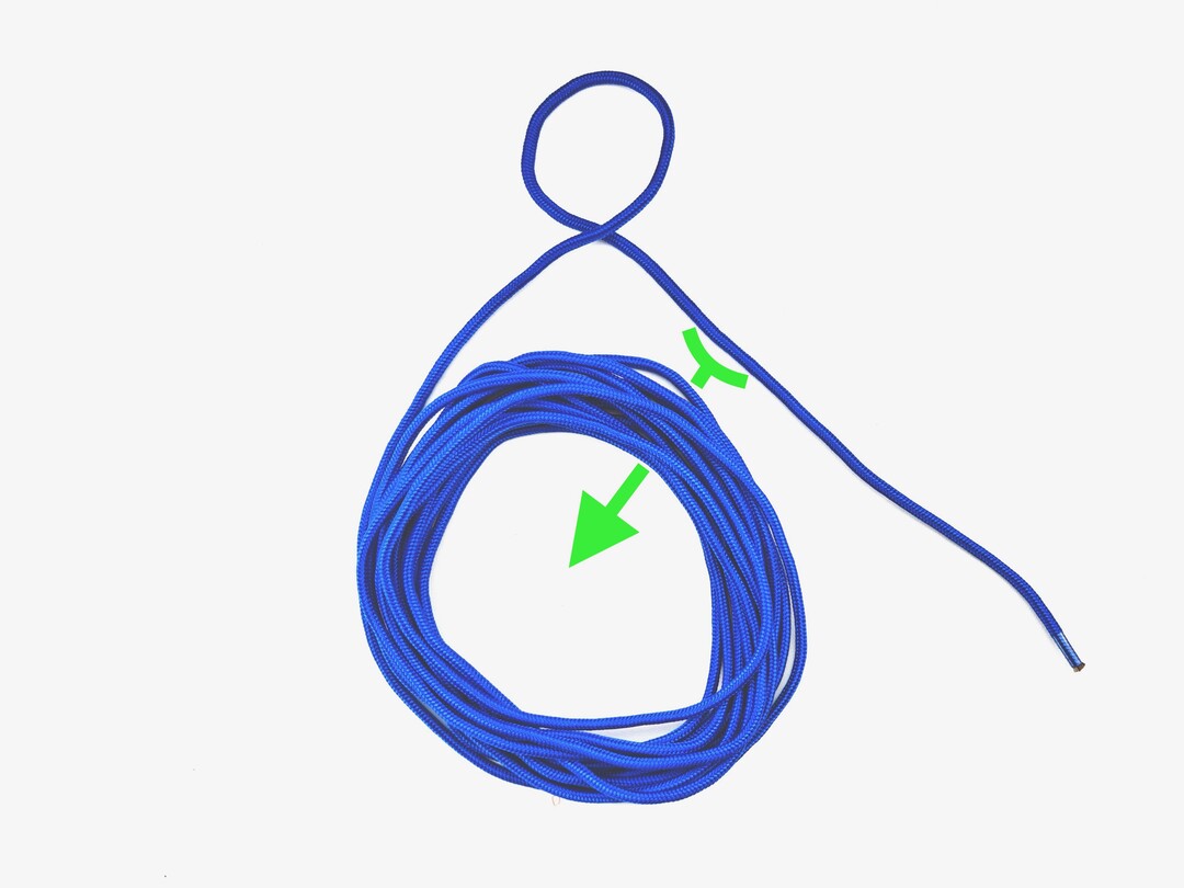 Step 2 of tying the Fireman's Coil knot - detailed visual instruction