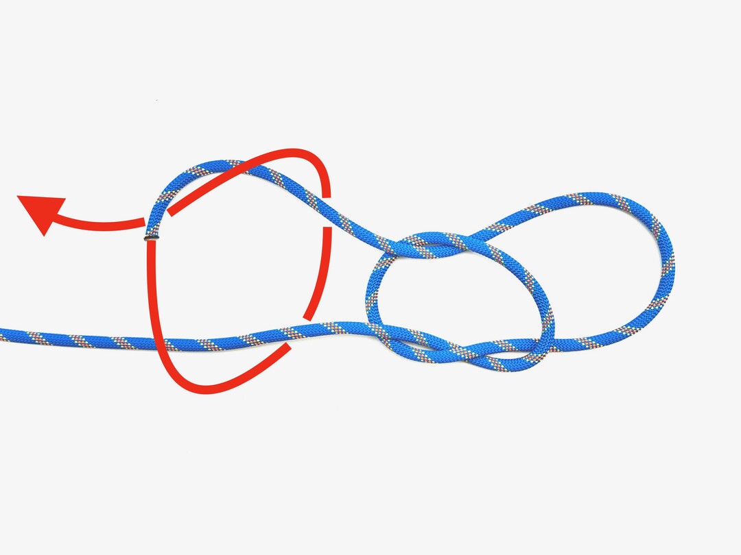 Step 4 of tying the Fisherman's Loop knot - detailed visual instruction