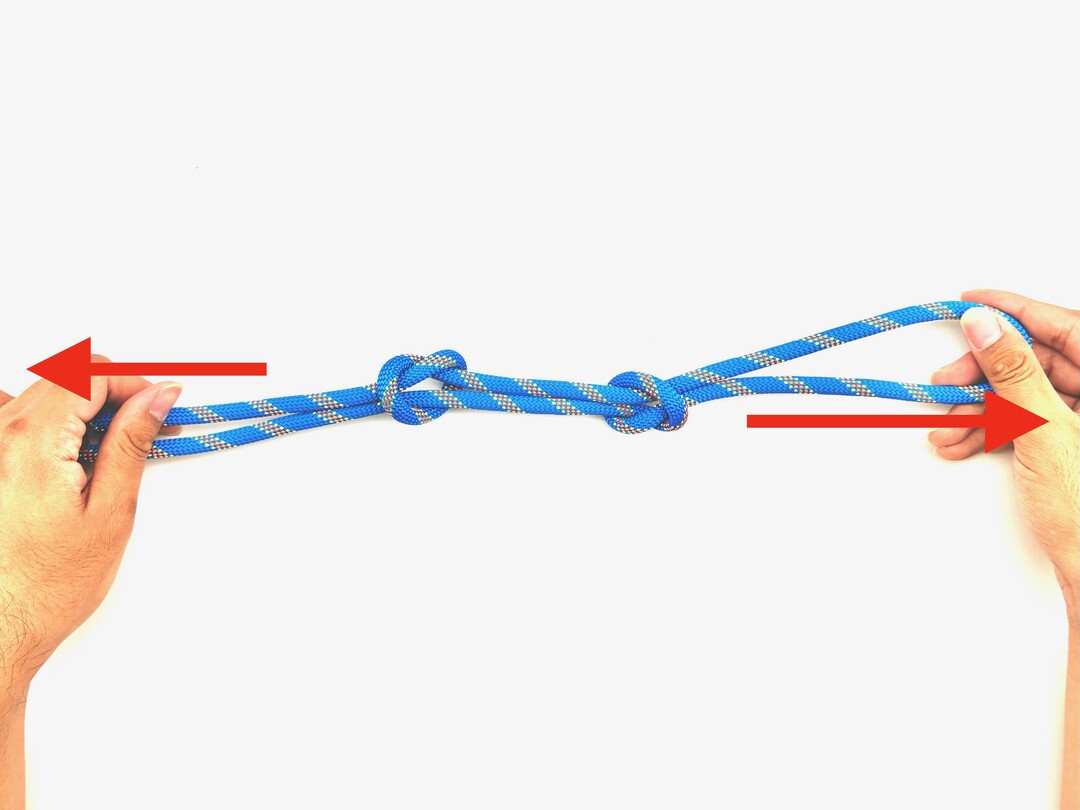 Step 6 of tying the Fisherman's Loop knot - detailed visual instruction
