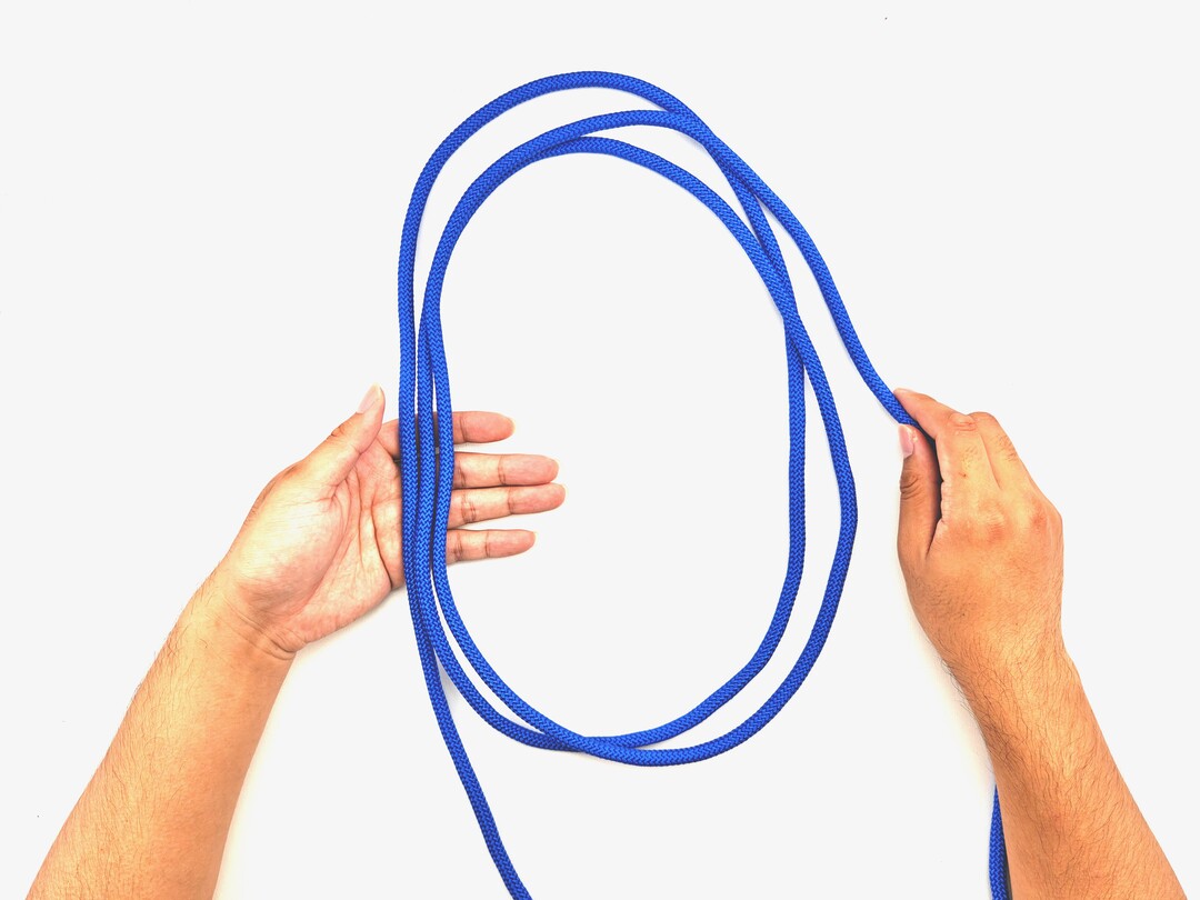 Step 2 of tying the Gasket Coil knot - detailed visual instruction