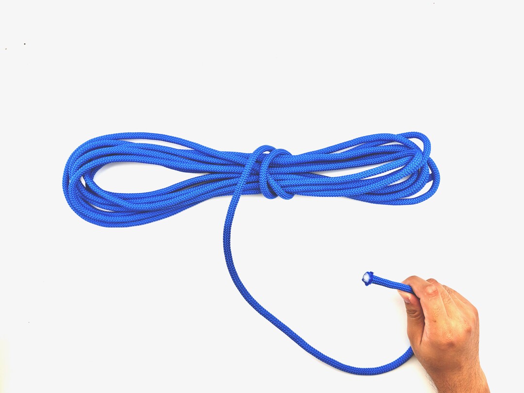 Step 5 of tying the Gasket Coil knot - detailed visual instruction