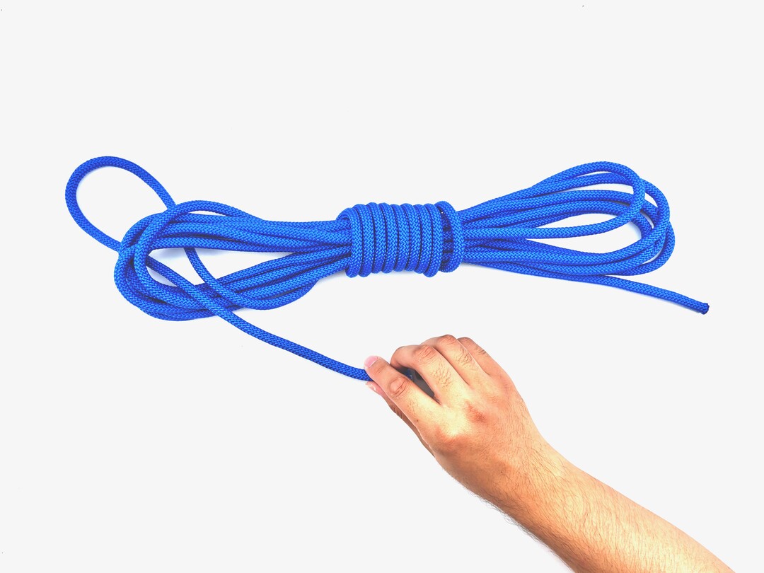 Step 7 of tying the Gasket Coil knot - detailed visual instruction