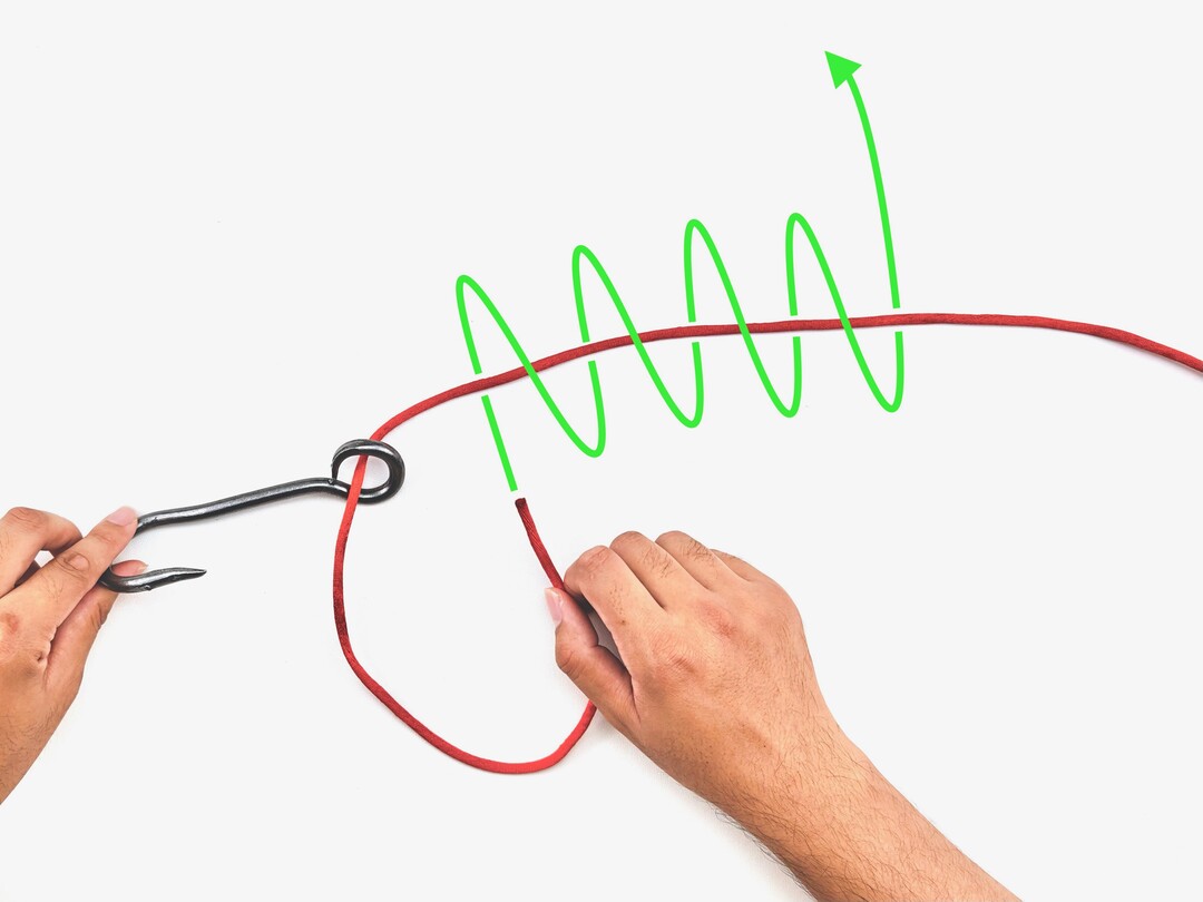 Step 1 of tying the Improved Clinch Knot knot - detailed visual instruction