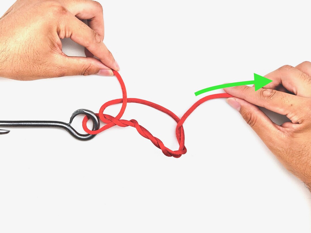 Step 4 of tying the Improved Clinch Knot knot - detailed visual instruction