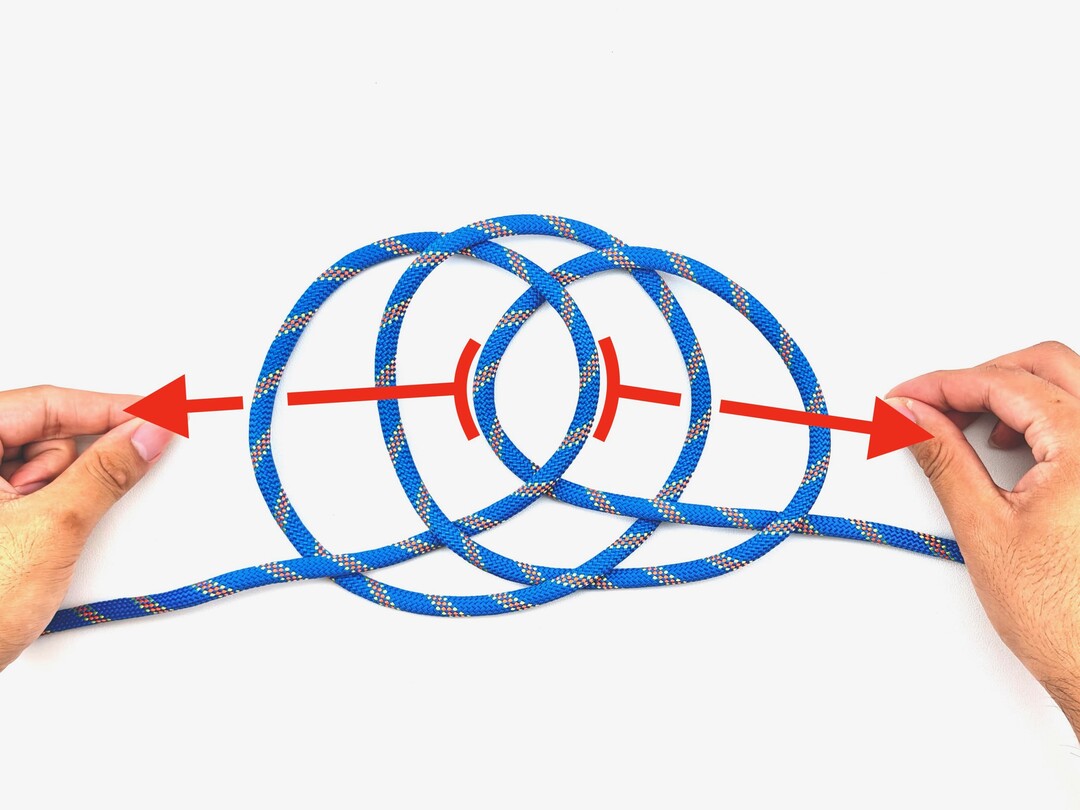 Step 2 of tying the Jury Mast Knot knot - detailed visual instruction