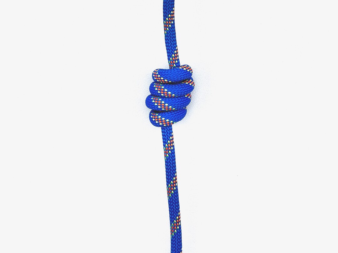 Step 1 of tying the Multiple Overhand Knot knot - detailed visual instruction